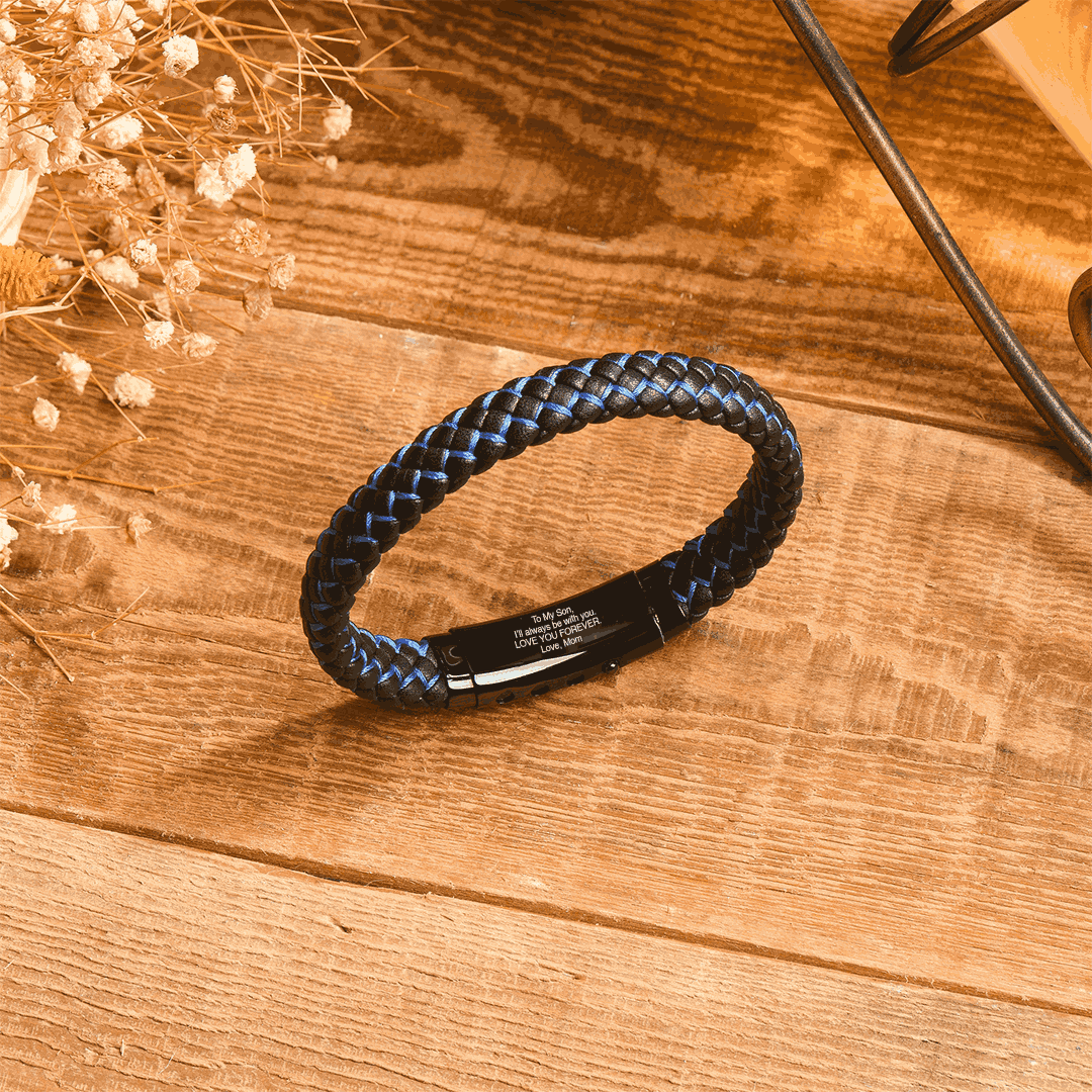 To My Son, Love You Forever Two-toned Leather Braided Bracelet on a wooden background