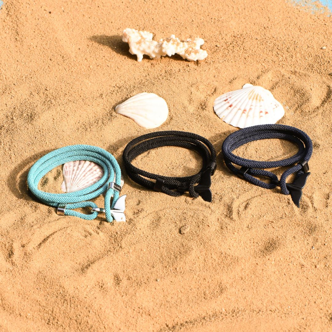 assorted color To My Son Whale Tail Nautical Bracelets on a sandy background